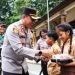 Dukung Program Pemerintah, Kapolres Gianyar Distribusikan Makanan Bergizi ke SDN 2 Pupuan